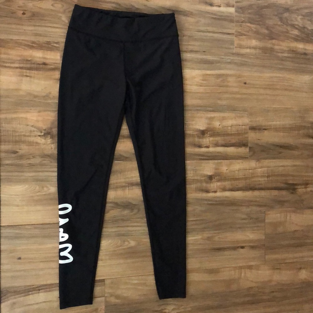 Curtis Kulig leggings with “Love Me” logo